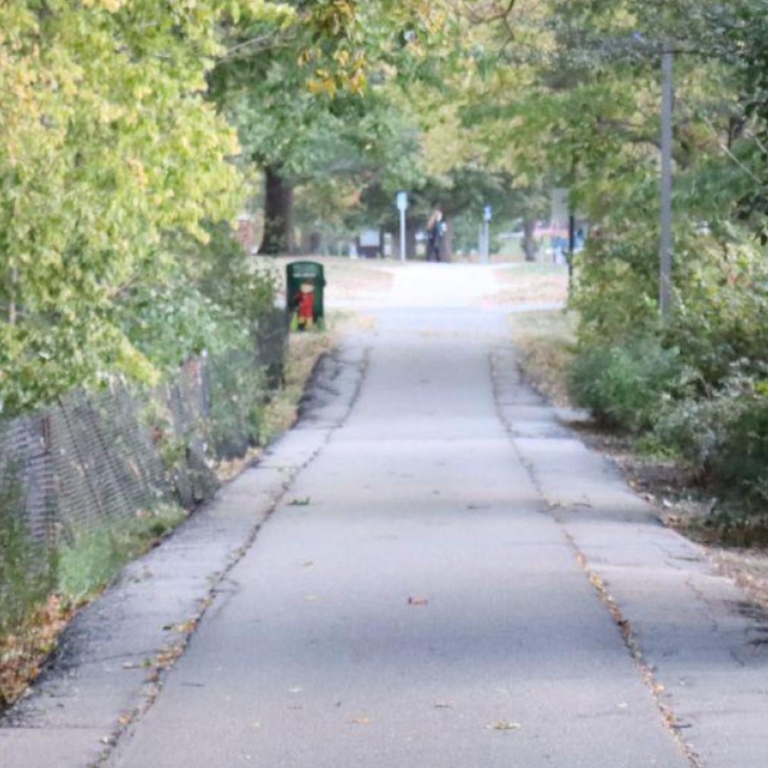 Outdoor Trash can at the end of walkway